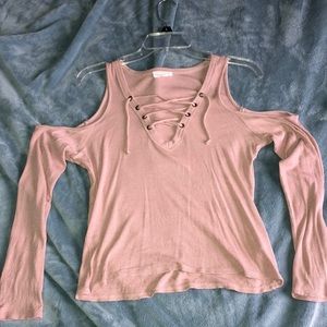 Open shoulder long sleeve top.